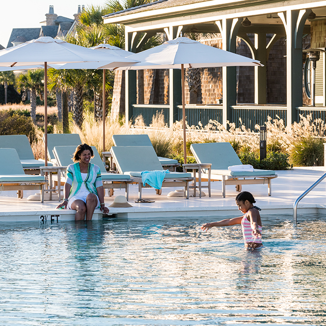 Mom & Daughter In Pool